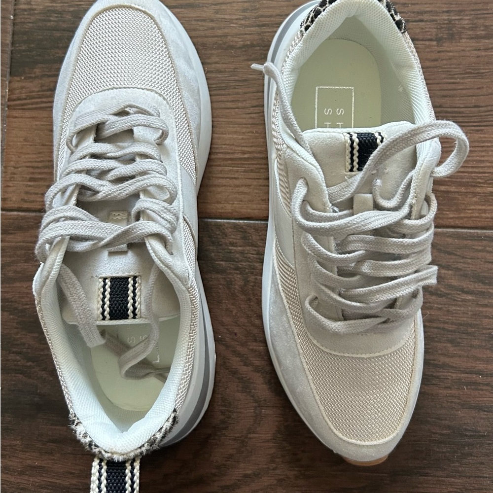 Stylish White Sneakers for Women Brand new. Never worn, just tried on.